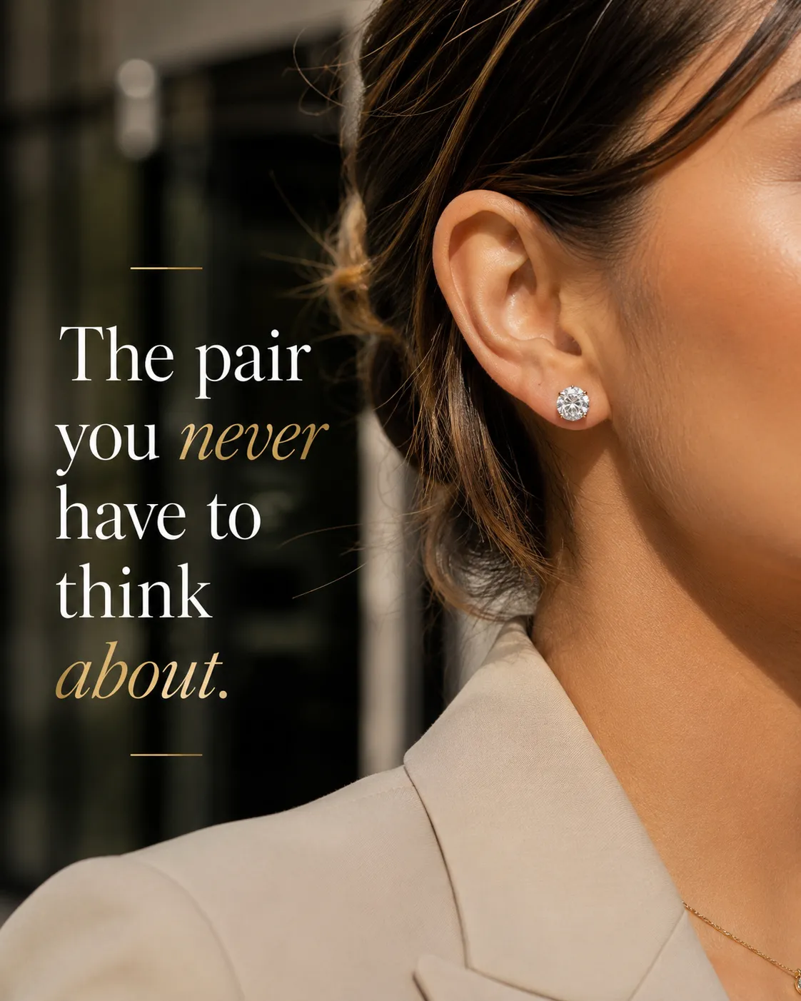 Woman wearing round diamond stud earrings