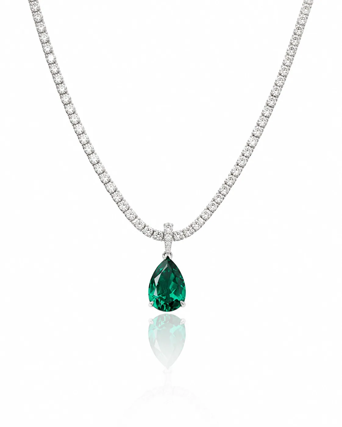Emerald pendant on a diamond chain