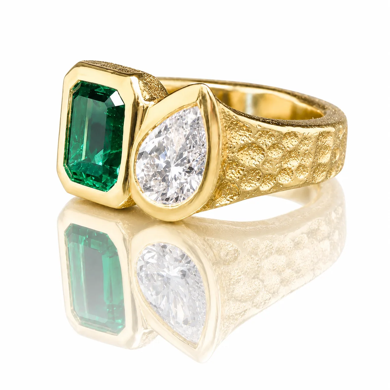 Emerald and pear gemstone statement rings